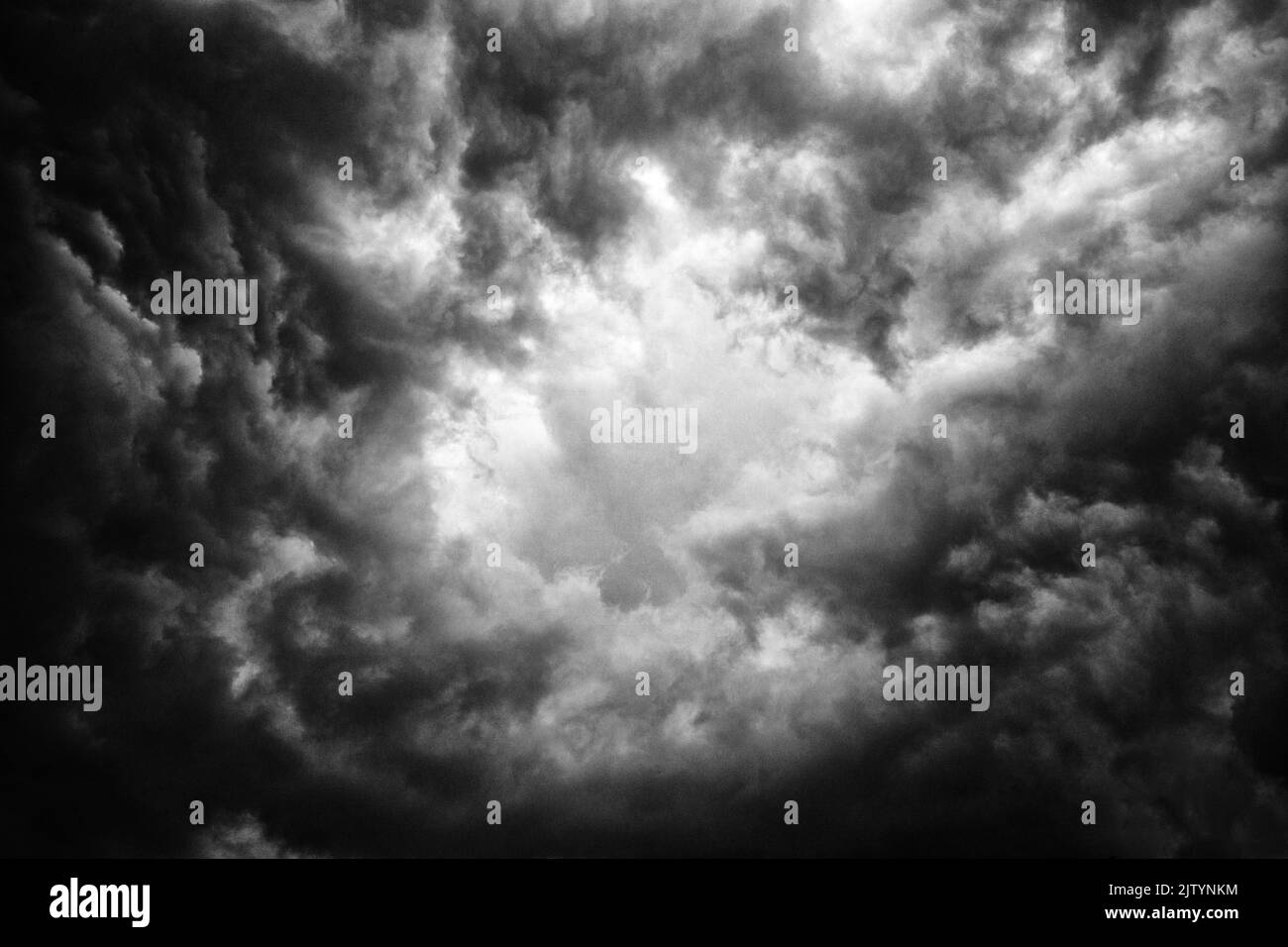 Fluffy grey clouds Black and White Stock Photos & Images - Alamy