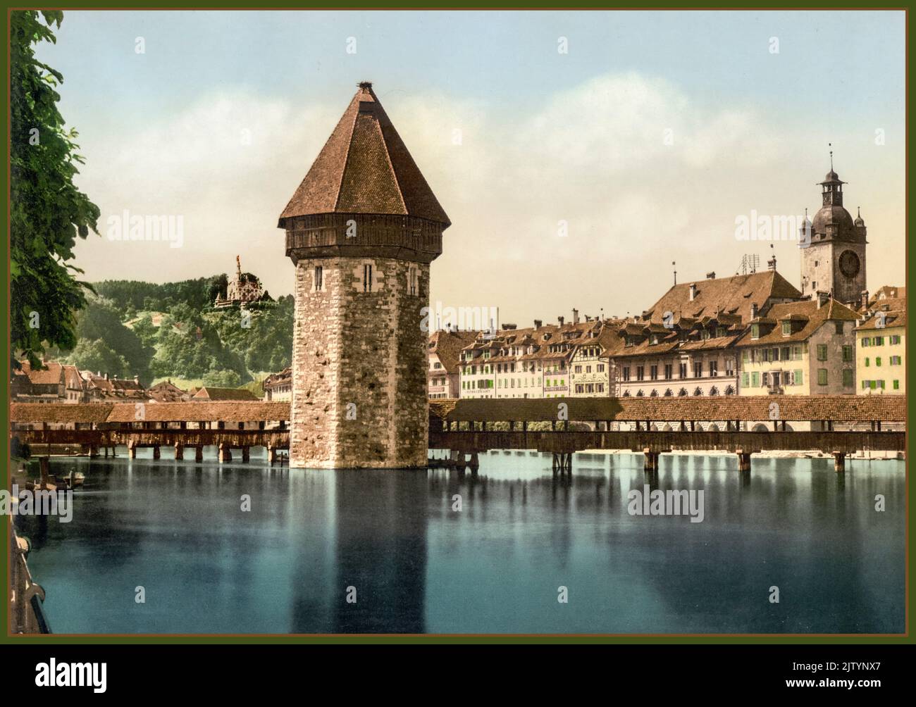 Vintage 1900 Lucerne Photochrom Travel Photograph of Chapel Bridge and view of Pilatus Mountains, Lucerne, Switzerland Postcard Stock Photo