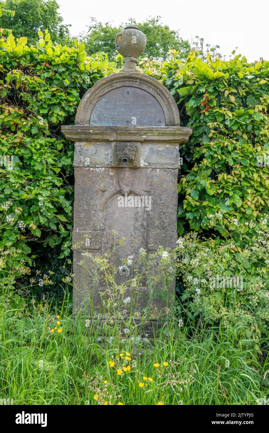 old village water pump the Cotswolds Gloucestershire England Stock Photo