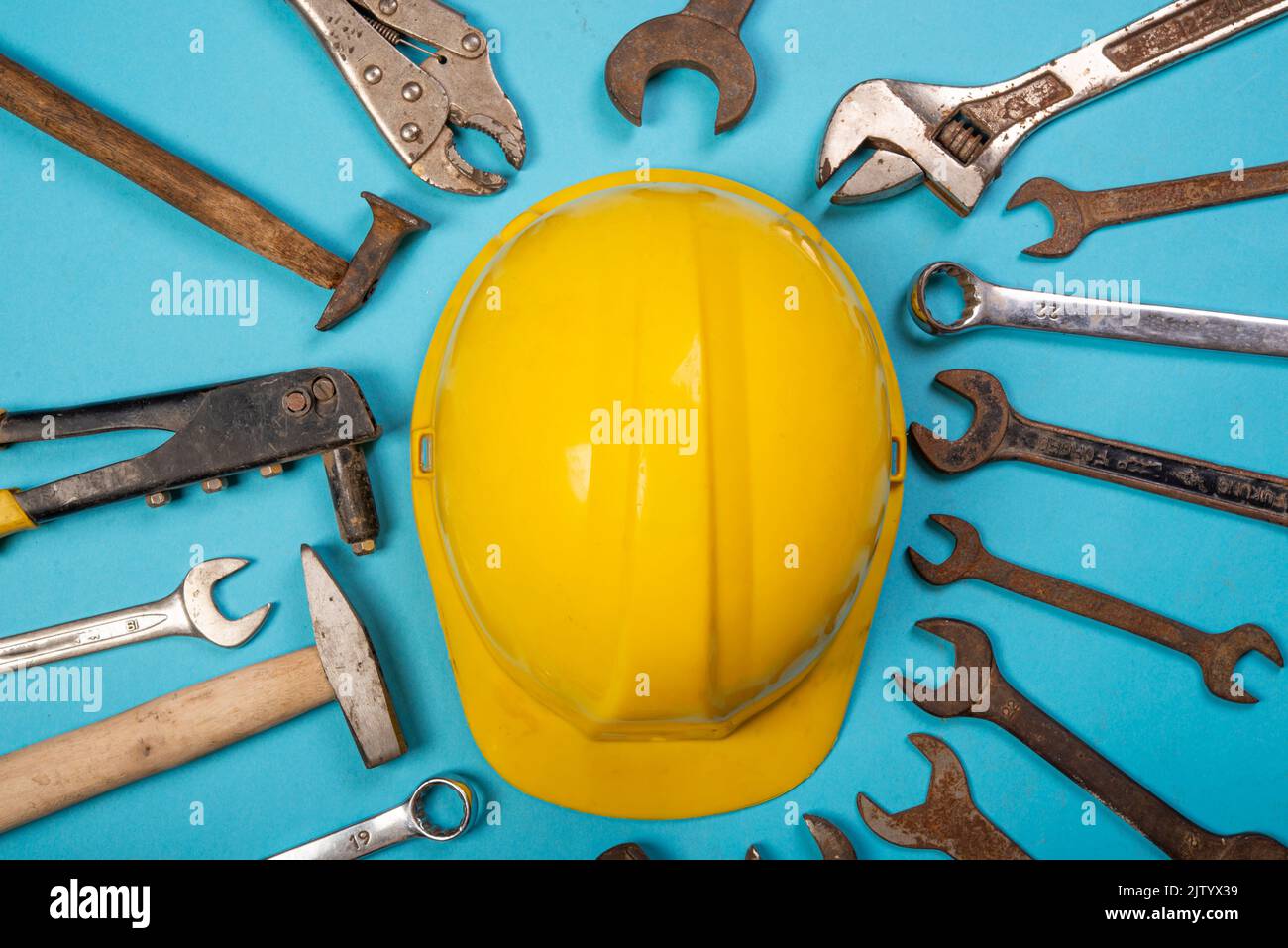 Happy labor day concept with safety cap and hardware tools. Stock Photo