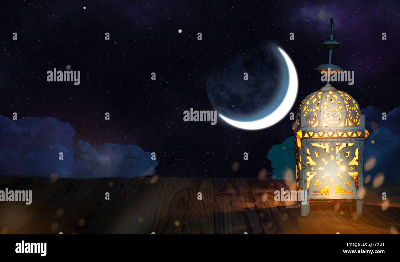 Ramadan Kareem celebration theme with lantern and first moon sight. Stock Photo
