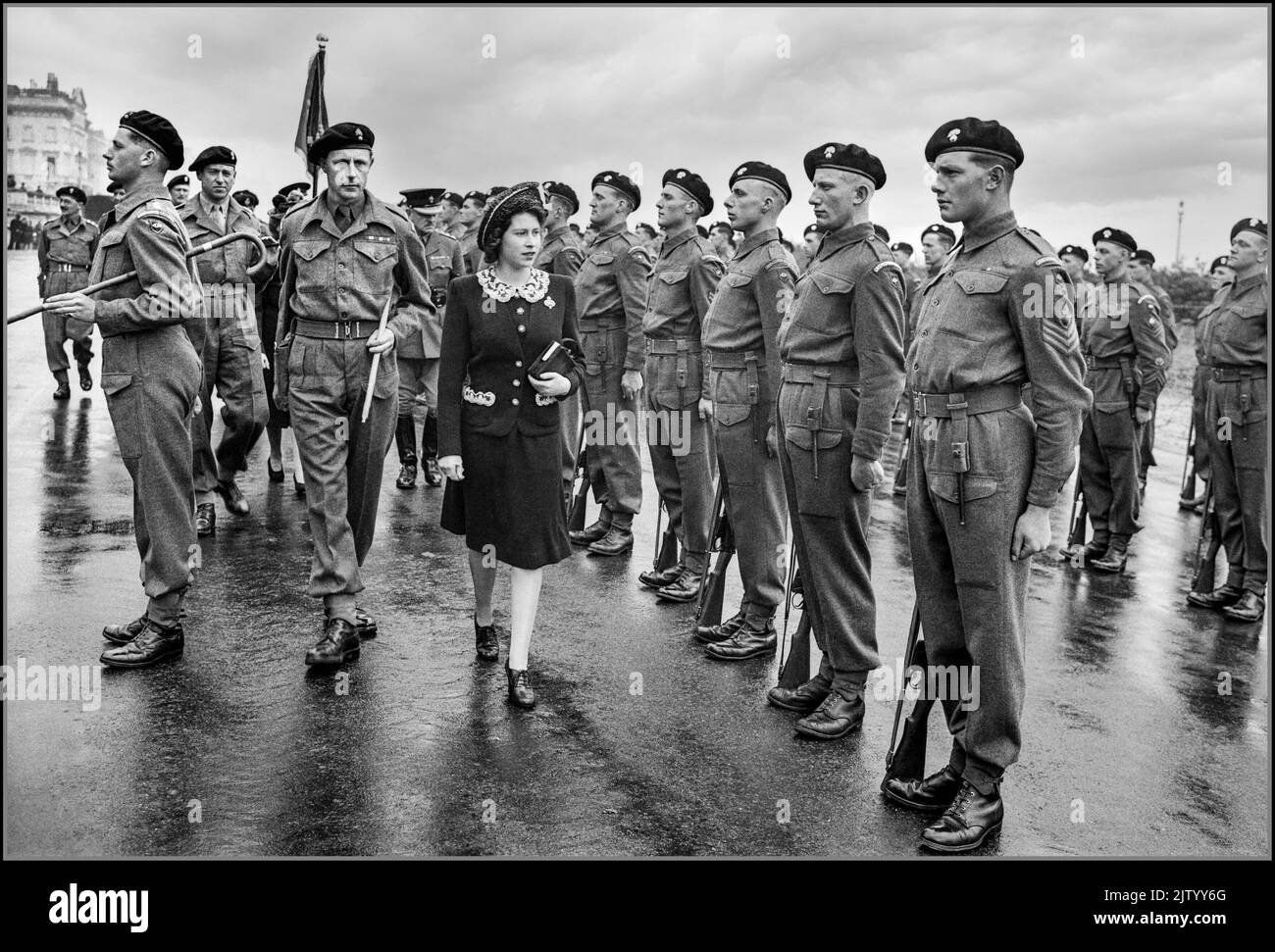 D-DAY WW2 PRINCESS ELIZABETH Allied Preparations For D-day The then Princess Elizabeth inspecting an honour guard during a Royal visit to 2nd (Armoured) Battalion Grenadier Guards, 5th Guards Armoured Brigade, Guards Armoured Division, at Hove, 17 May 1944. 17 May 1944 (Second World War) World War II Taken by War Office official photographer, Malindine E G (Captain) Stock Photo