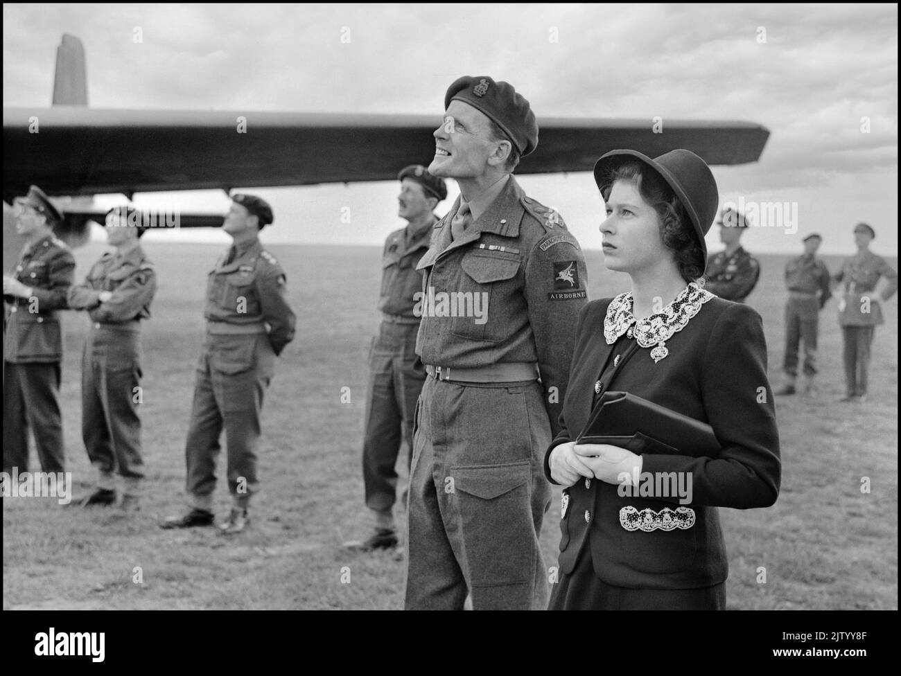 Princess Elizabeth WW2 Visiting Airborne Troops, May 1944 HRH Princess Elizabeth (Queen Elizabeth II) watching parachutists rehearsing parachute drops during a visit to airborne forces in England in the run-up preparations to D-Day. D-Day, Normandy Landings 1944, North West Europe, Second World War World War II Stock Photo