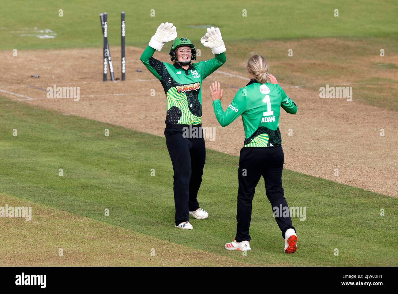 Southern Brave's Adams (right) celebrates after bowling out