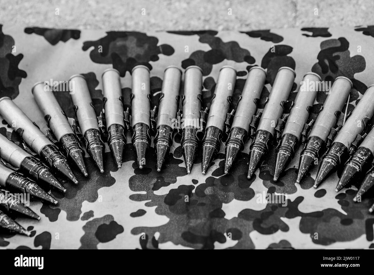 Details with 20mm ammunition for a military helicopter gun. Stock Photo
