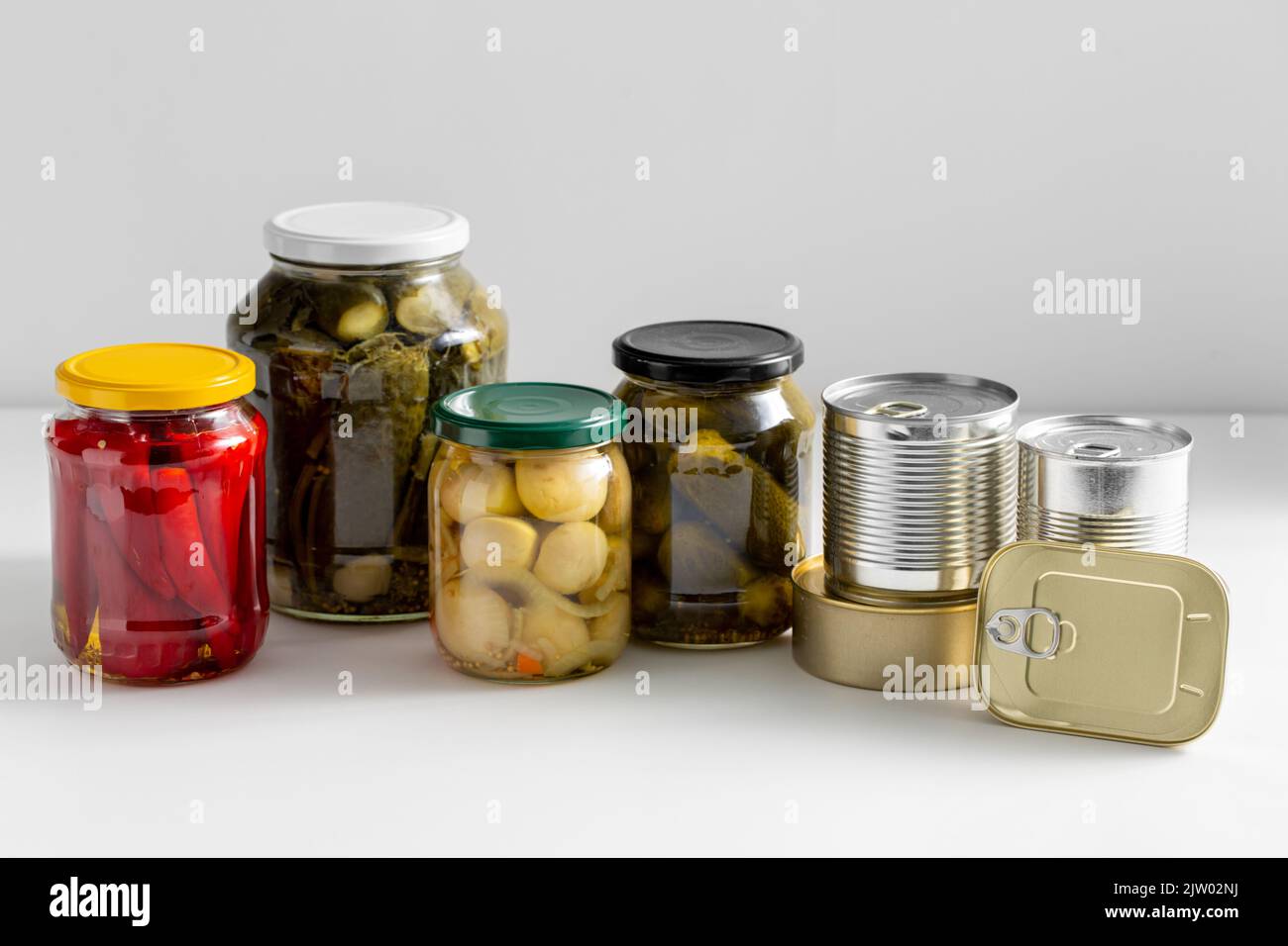 close up of jars and tin cans with preserved food Stock Photo Alamy