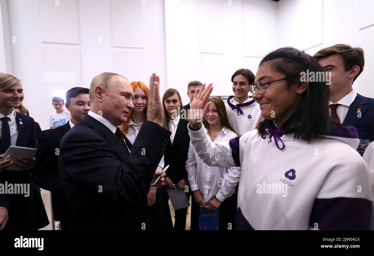 Kaliningrad, Russia. 01st Sep, 2022. Russian President Vladimir Putin, high-fives students following an open lesson with the winners of cultural, scientific and sports student competitions at the Museum and Theatre Educational Complex, September 1, 2022 in Kaliningrad, Russia. Credit: Gavriil Grigorov/Kremlin Pool/Alamy Live News Stock Photo