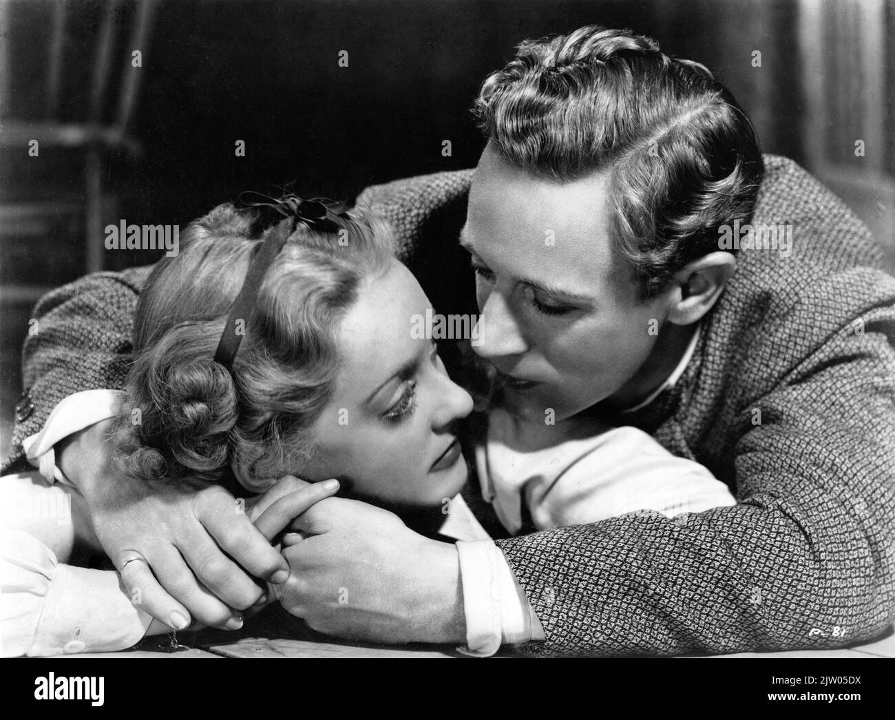 BETTE DAVIS and LESLIE HOWARD in THE PETRIFIED FOREST 1936 director ARCHIE MAYO play Robert E. Sherwood screenplay Charles Kenyon and Delmer Daves Warner Bros. Stock Photo