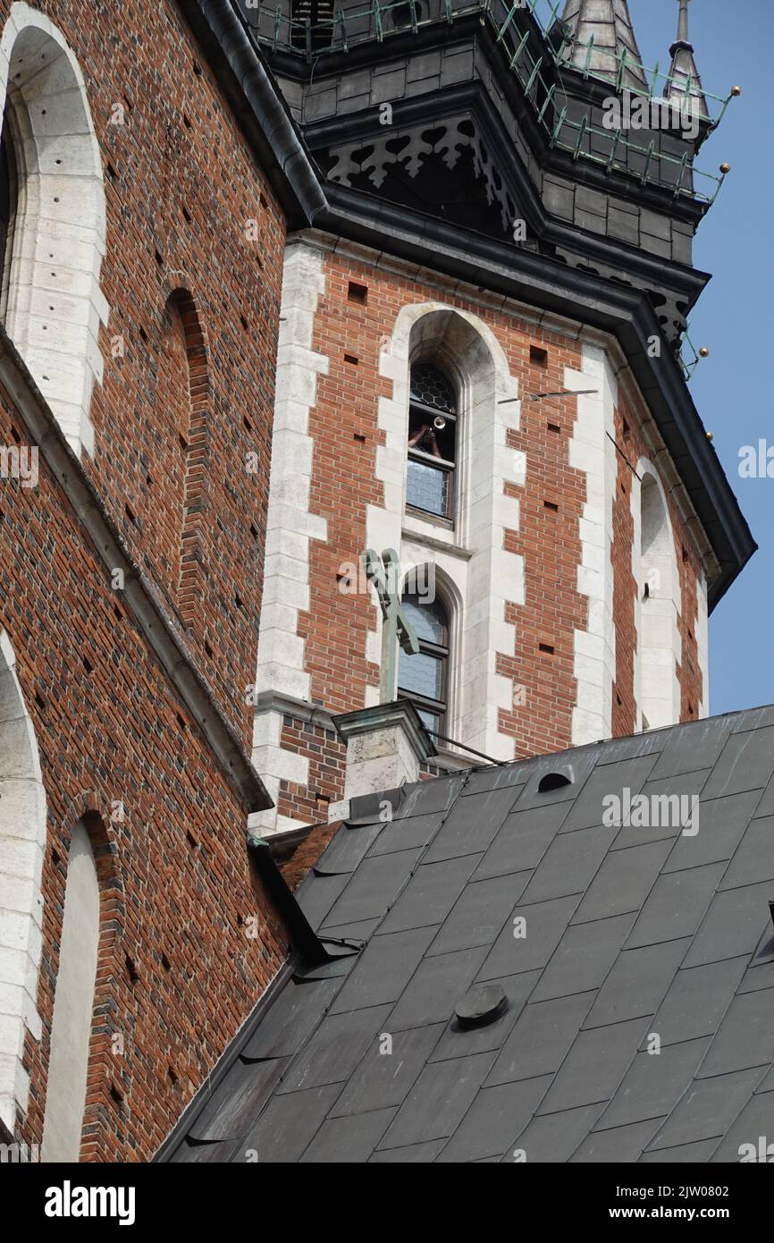 Trumpeter playing the hourly St Mary's Trumpet Call, Hejnal mariacki