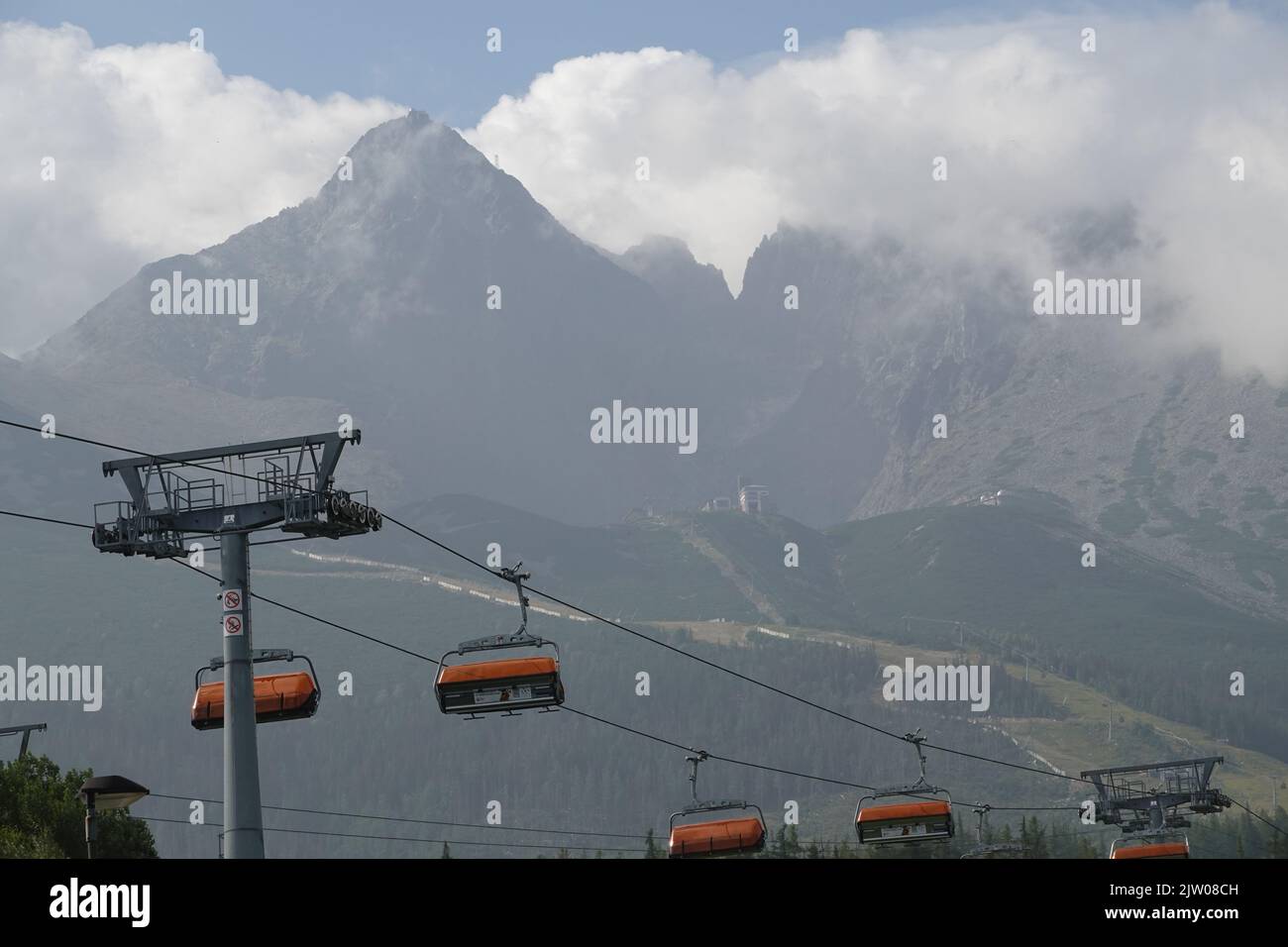 Cable car in Slovakian High Tatras with Lomnicky Stit mountain in background Stock Photo