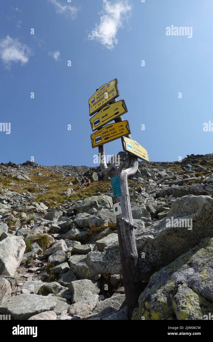 Trail sign post on route to the summit of Krivan Mountain, Slovakia, Europe Stock Photo