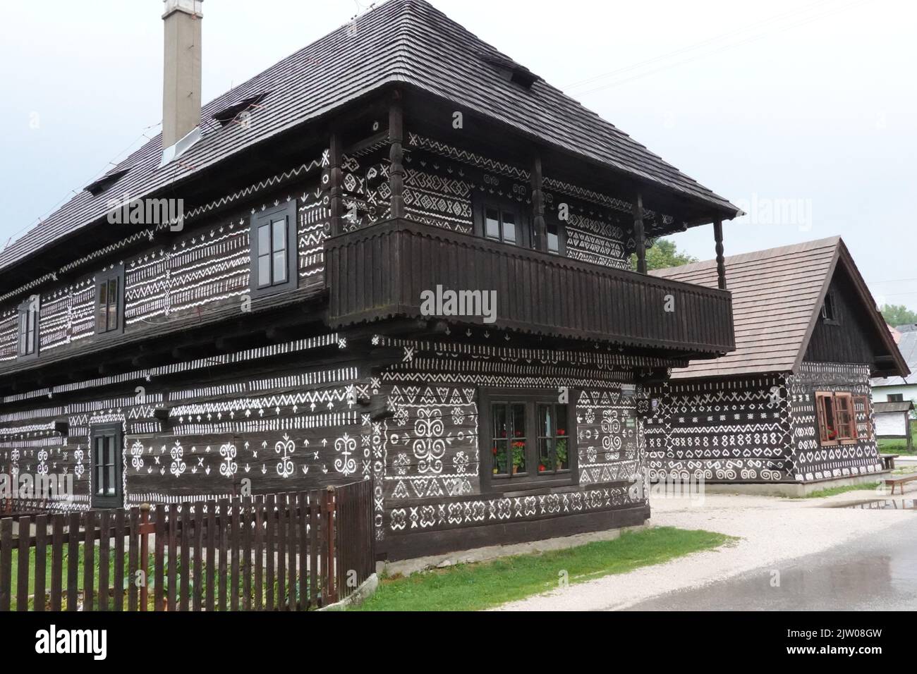Beautiful painted wooden houses in the historic Slovakian village of Cicmany, Slovakia central Europe Stock Photo