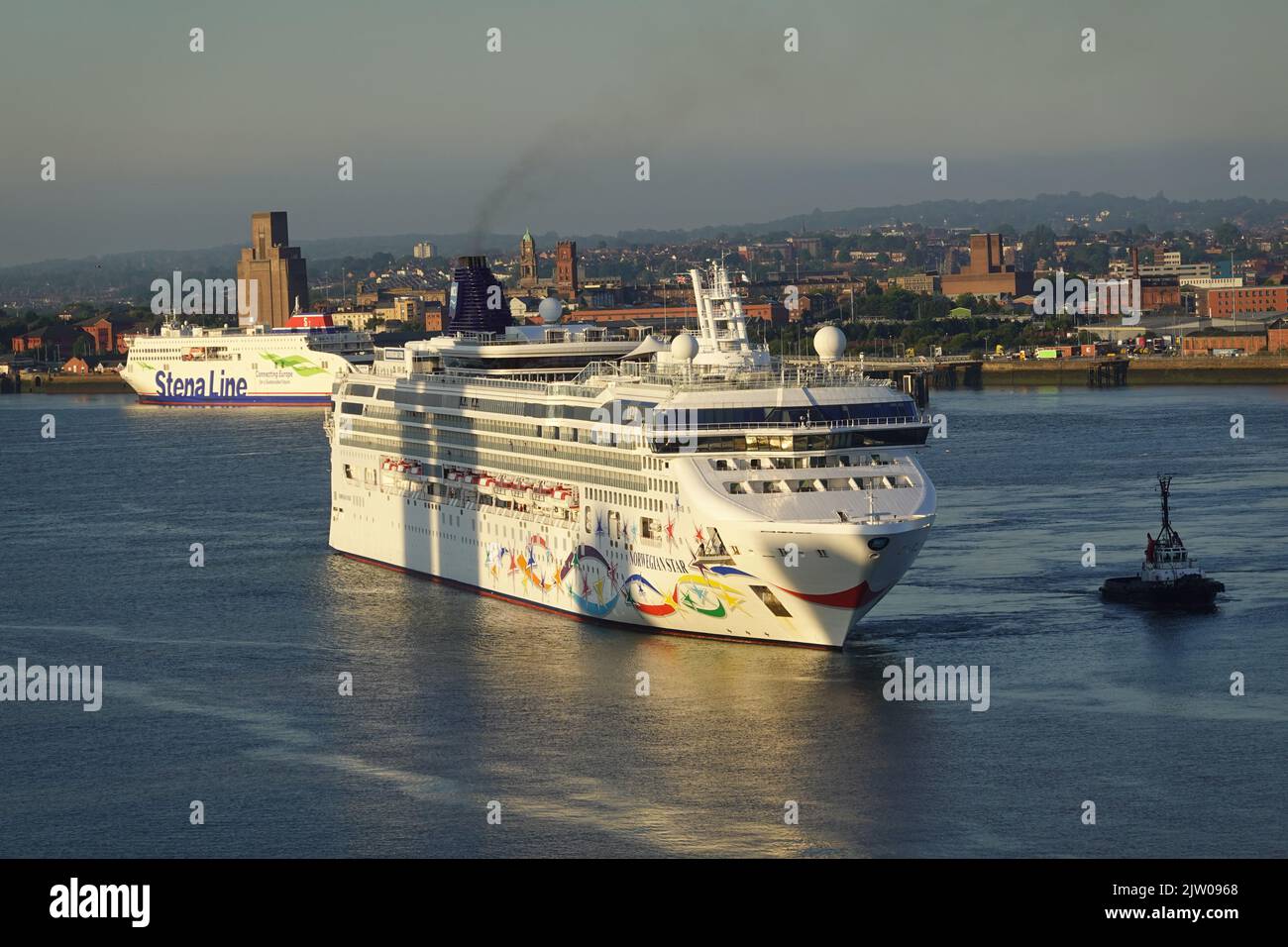 Norweigan Star Cruise liner docking in Liverpool harbour, river Mersey, England, UK Stock Photo
