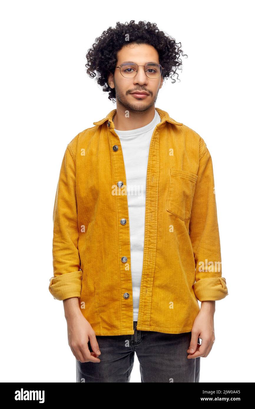 man in glasses and yellow jacket Stock Photo