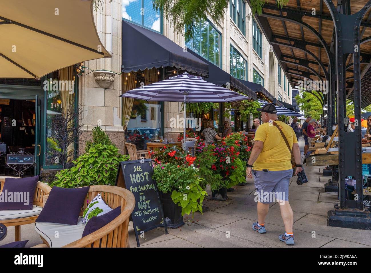 Ashville, North Carolina, USA - August 27, 2022:  Downtown district offers a variety of restaurants and shops. Stock Photo