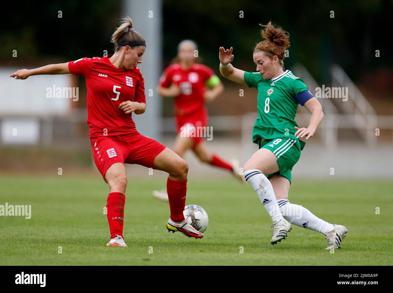 Soccer Football - FIFA Women's World Cup Australia and New Zealand - UEFA Qualifiers - Group D - Luxembourg v Northern Ireland - Stade Emile Mayrisch, Esch-sur-Alzette, Luxembourg - September 2, 2022 Luxembourg's Emma Kremer in action with Northern Ireland's Marissa Callaghan REUTERS/Gonzalo Fuentes Stock Photo