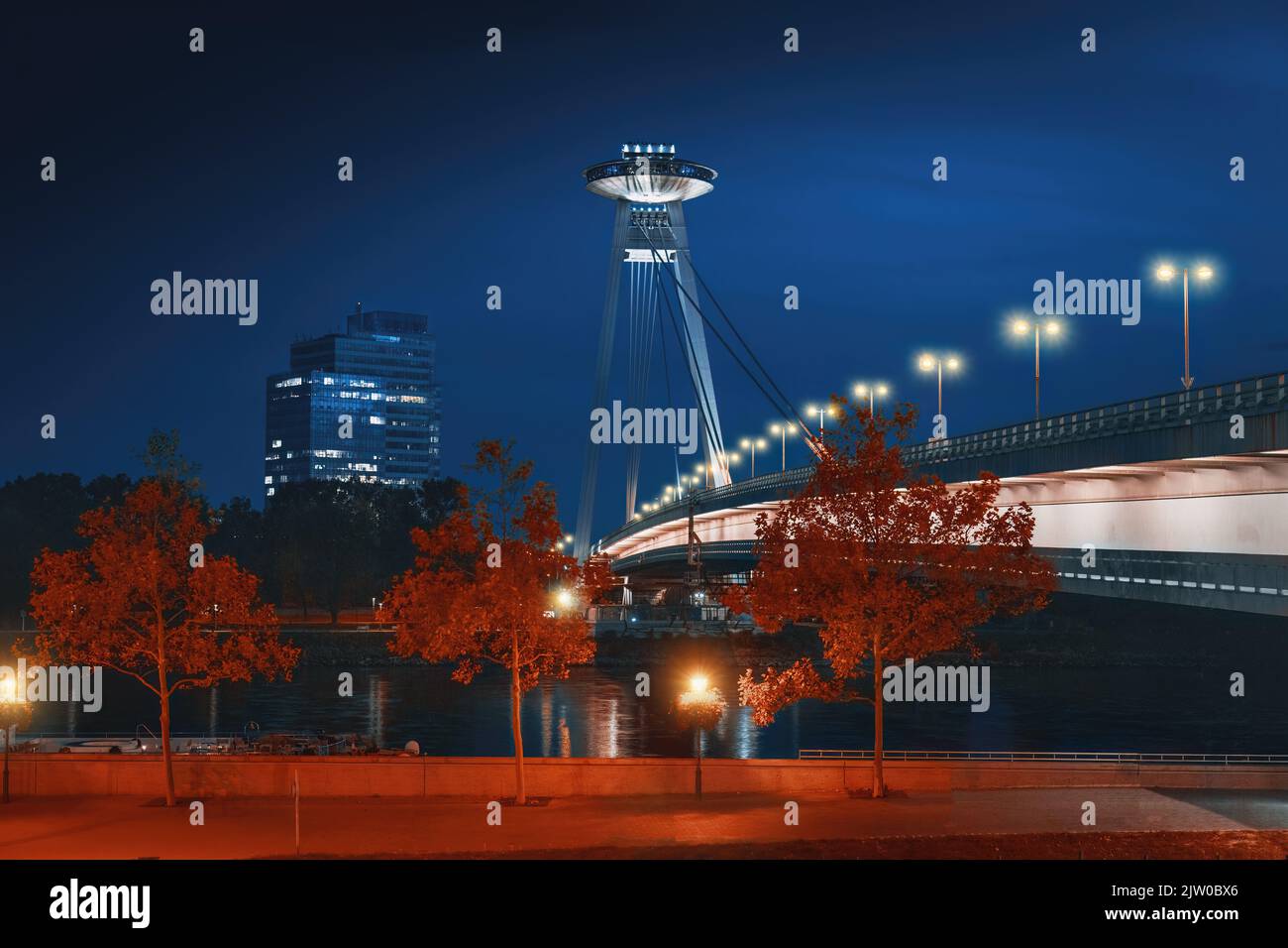 SNP Bridge and UFO Tower at night - Bratislava, Slovakia Stock Photo