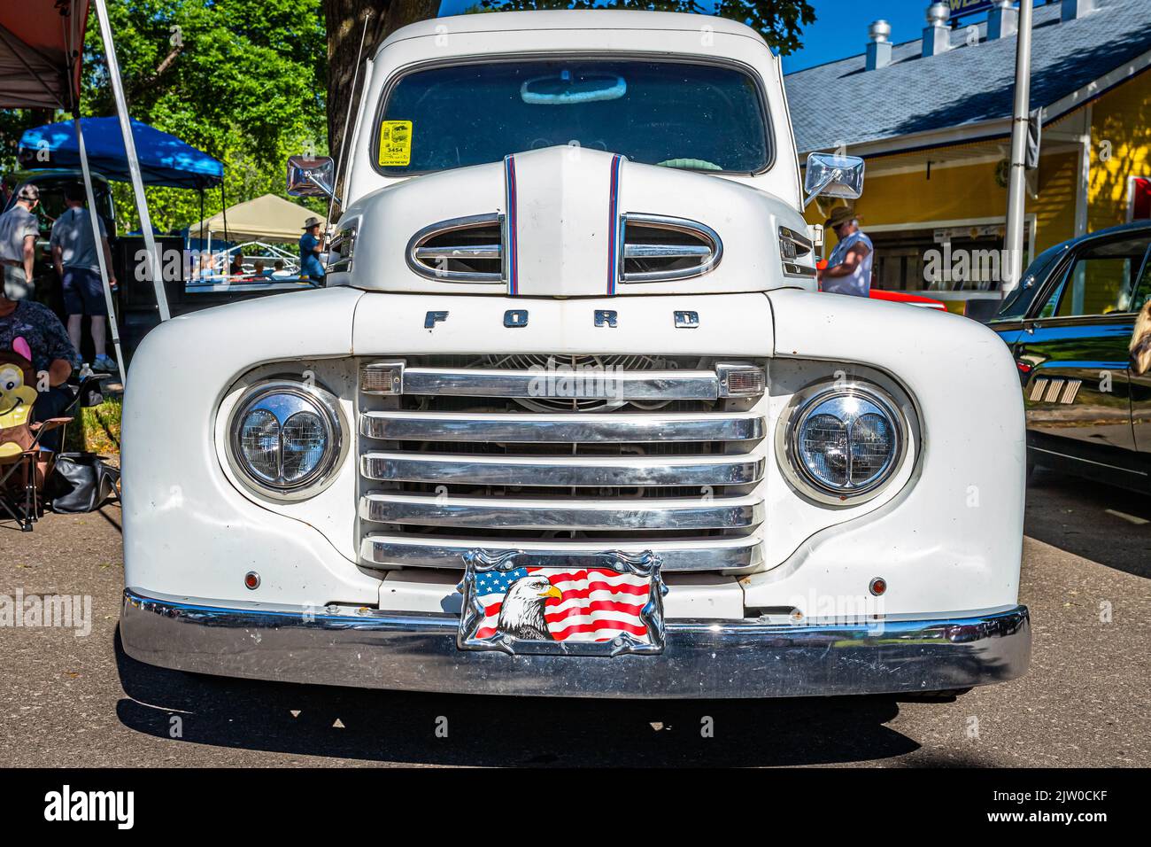 Falcon Heights, MN - June 17, 2022: Low perspective front view of a 1948 Ford F1 Panel Delivery Truck at a local car show. Stock Photo