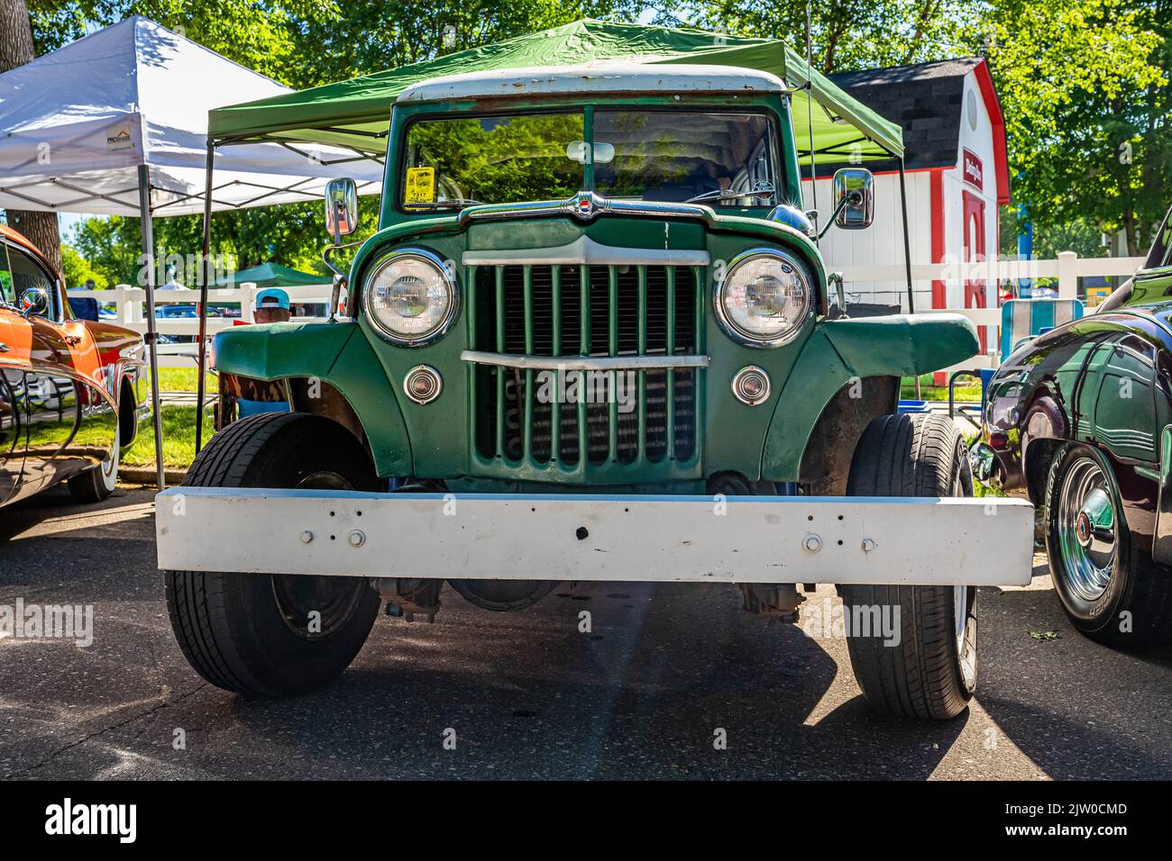 Falcon Heights, MN - June 17, 2022: Low perspective front view of a1954 Willys Overland Station Wagon at a local car show. Stock Photo