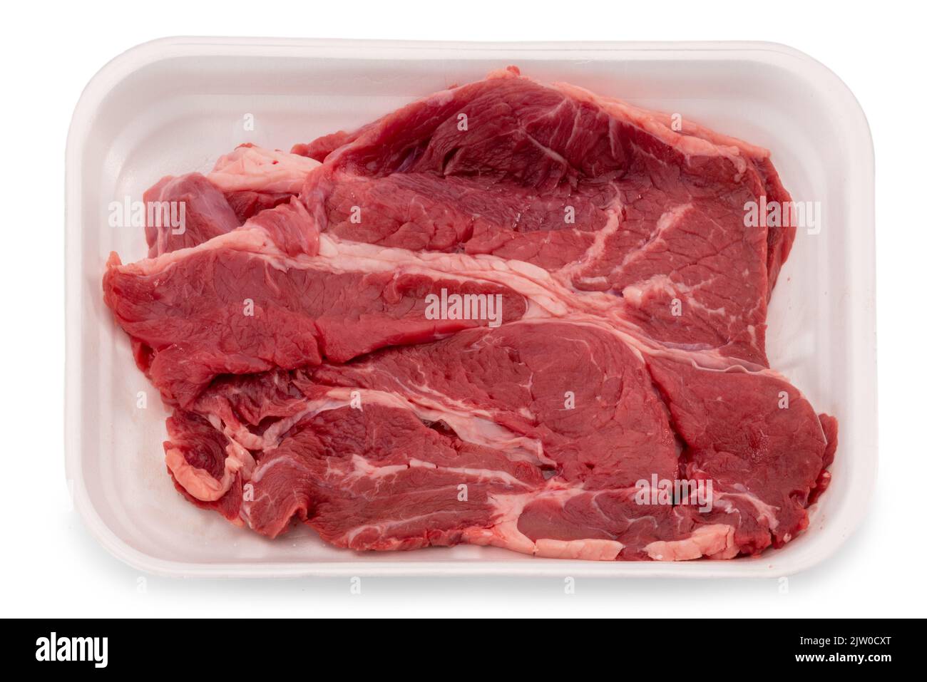Raw beef steak in styrofoam food tray isolated on white, clipping path Stock Photo
