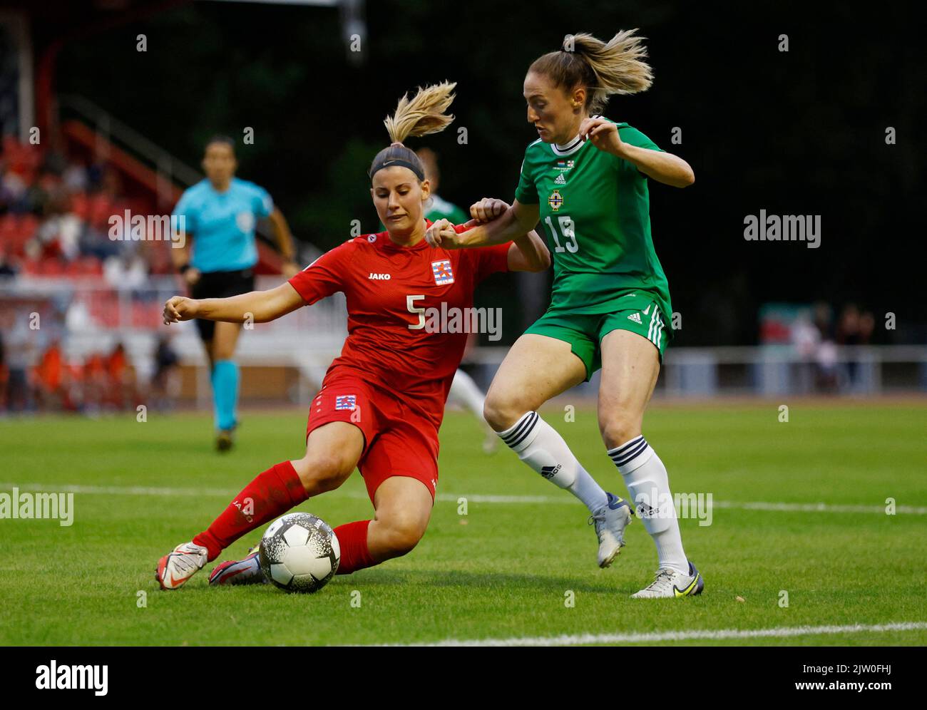 Soccer Football - FIFA Women's World Cup Australia and New Zealand - UEFA Qualifiers - Group D - Luxembourg v Northern Ireland - Stade Emile Mayrisch, Esch-sur-Alzette, Luxembourg - September 2, 2022 Luxembourg's Emma Kremer in action with Northern Ireland's Rebecca Holloway REUTERS/Gonzalo Fuentes Stock Photo