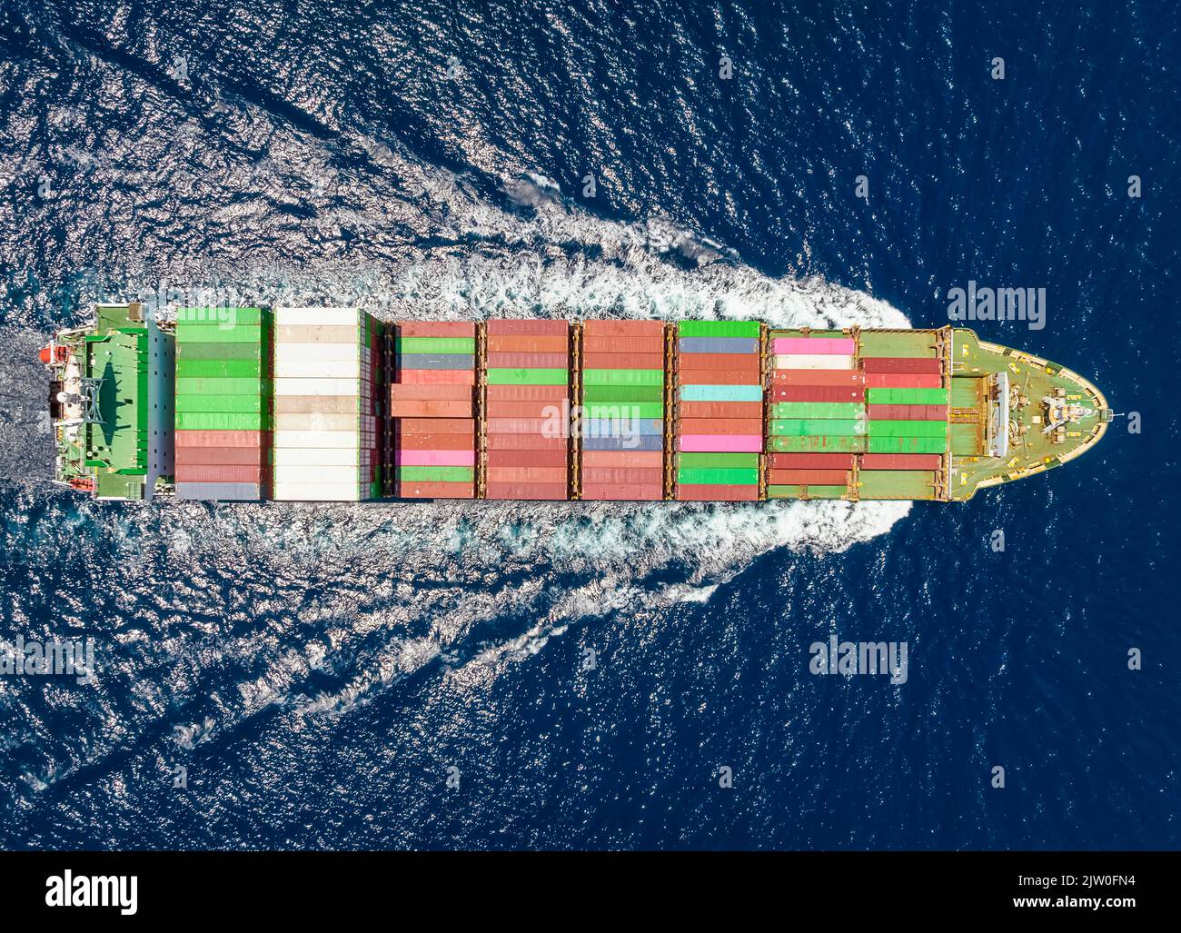 Aerial top view of a loaded cargo container ship Stock Photo