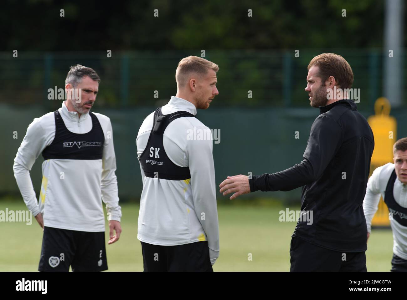 Oriam Sports Centre Edinburgh.Scotland UK.2nd.Sept 22 Hearts Manager Robbie Neilson chats with Stephen Kingsley training session for Cinch Premiership match vs Livingston Credit: eric mccowat/Alamy Live News Stock Photo