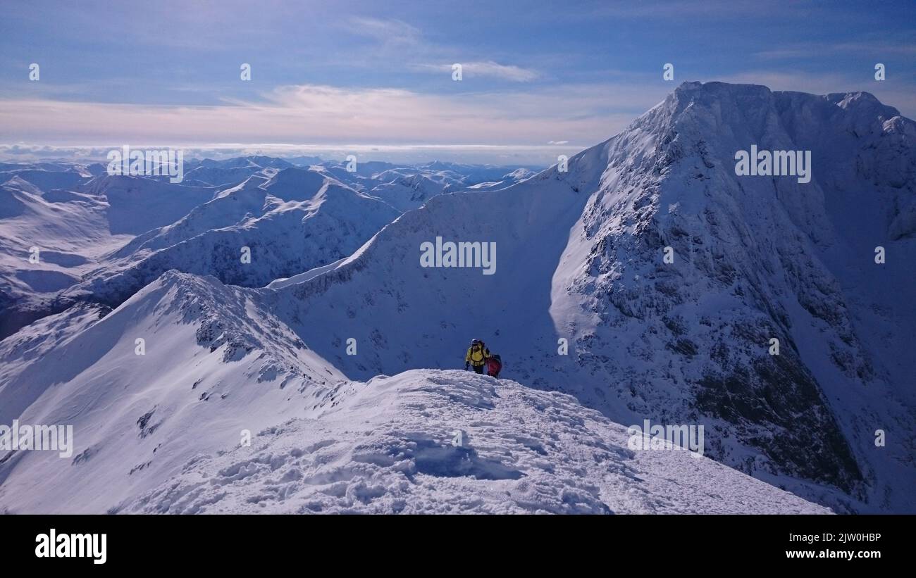 Drone hikers on peak snowy hi-res stock photography and images - Alamy