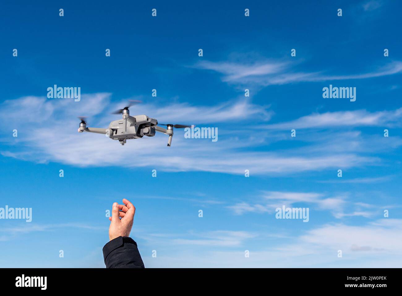 the drone takes off from the hands of the operator  Stock Photo