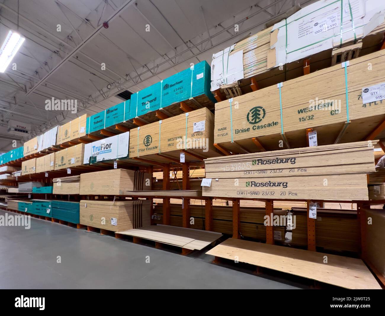 Victorville, CA, USA – August 29, 2022: Large aisle of plywood sheets at a Home Depot inDepot in Victorville, California. Stock Photo