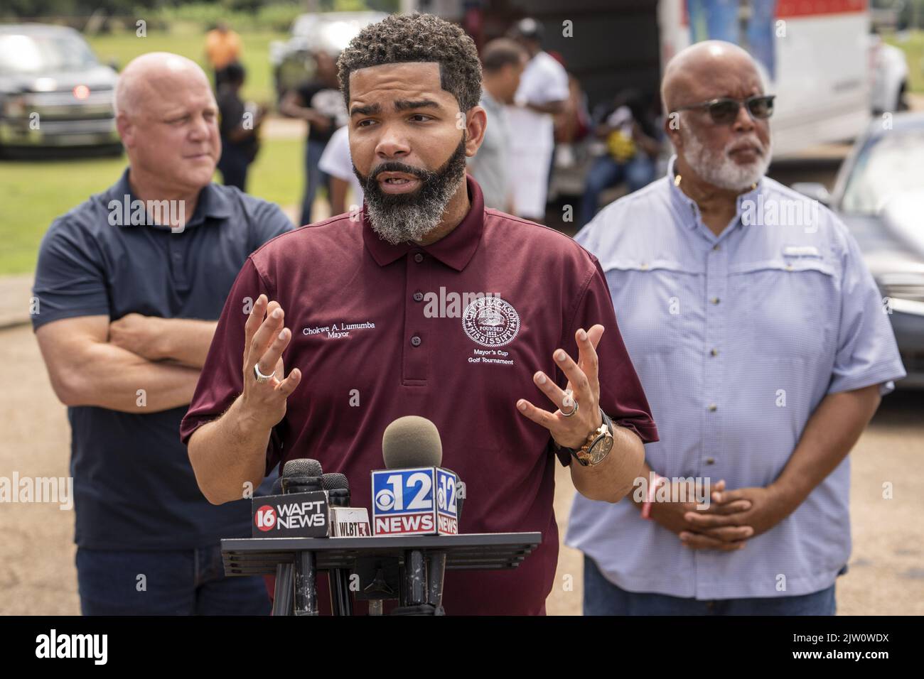 Jackson, USA. 02nd Sep, 2022. Mayor Chokwe Antar Lumumba (C) of Jackson, Mississippi, stands with Rep. Bennie Thompson, D-MS, (R) and Mitch Landrieu, Senior Advisor to President Biden, as they speak about the current water crisis in Jackson, Mississippi on Friday, September 2, 2022. Jackson has gone days without reliable water service when river flooding caused the main treatment facility to fail. Photo by Ken Cedeno/UPI Credit: UPI/Alamy Live News Stock Photo