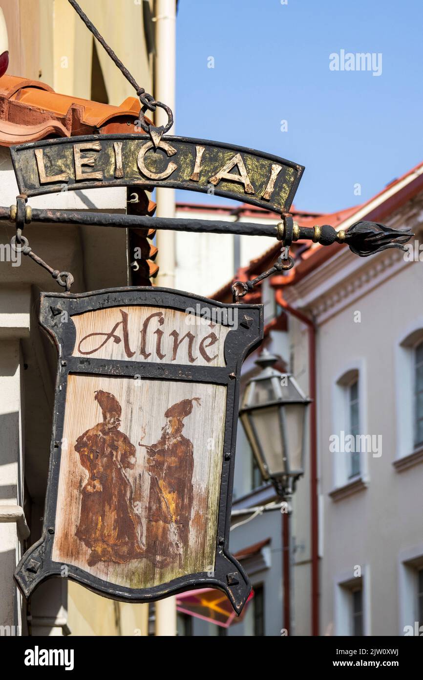 Aline Leiciai, hanging sign outside pub and restaurant in Vilnius, Lithuania, Baltics, Europe Stock Photo