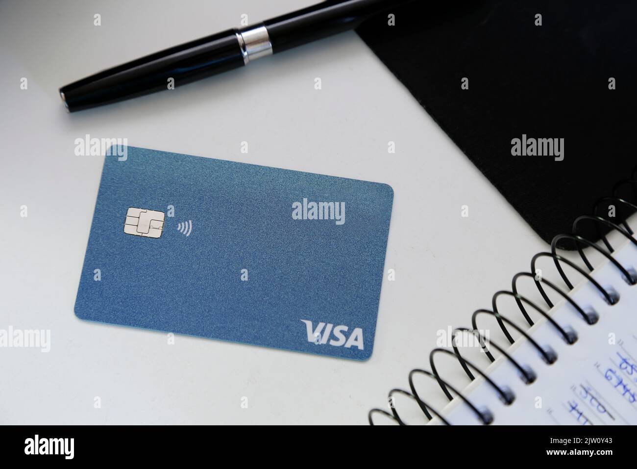 Minas Gerais, Brazil - August 28, 2022: blue contactless credit card and Visa brand Stock Photo
