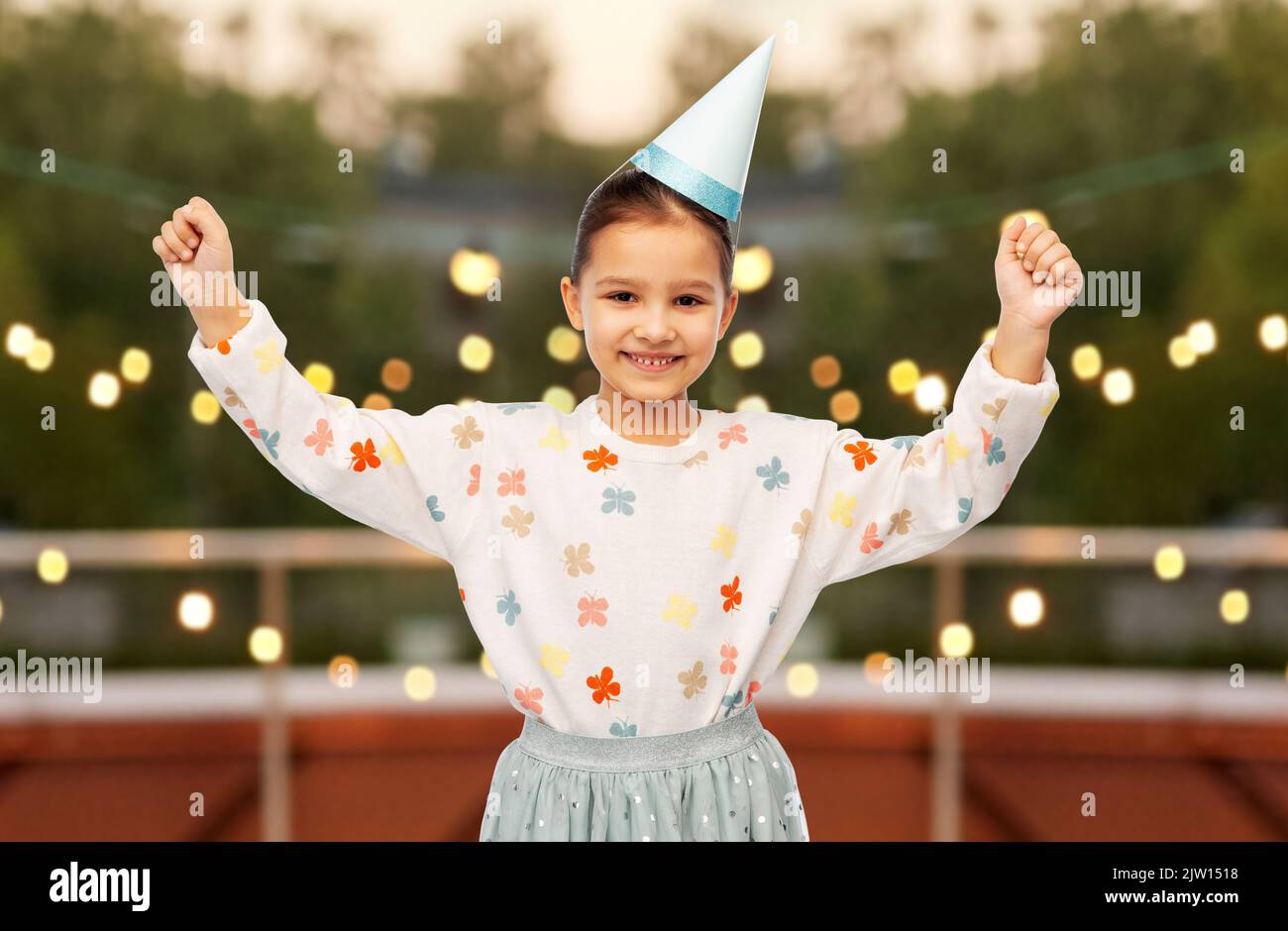 happy smiling little girl in birthday party hat Stock Photo - Alamy