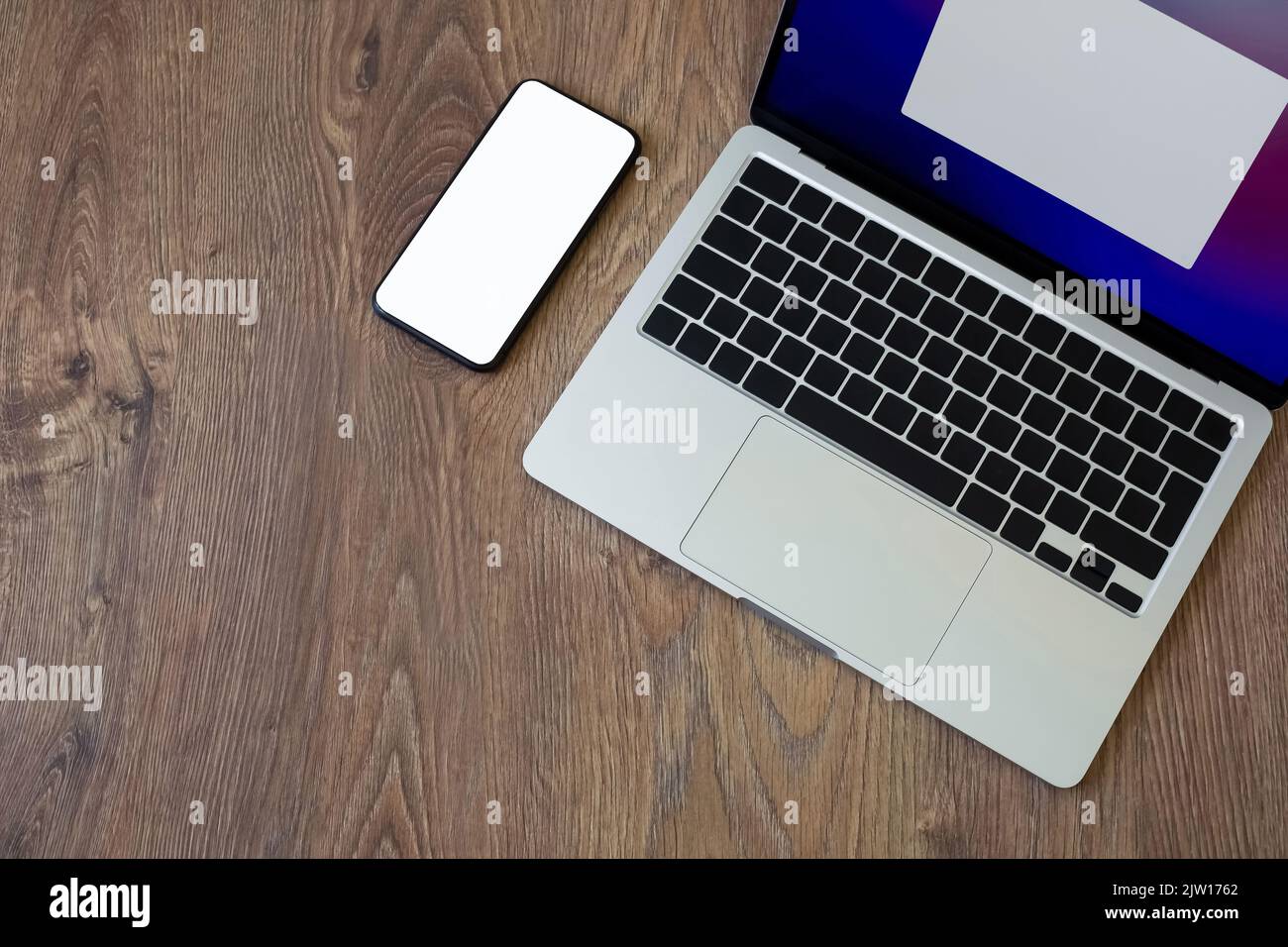 Computer splash screen and blank phone screen Stock Photo - Alamy