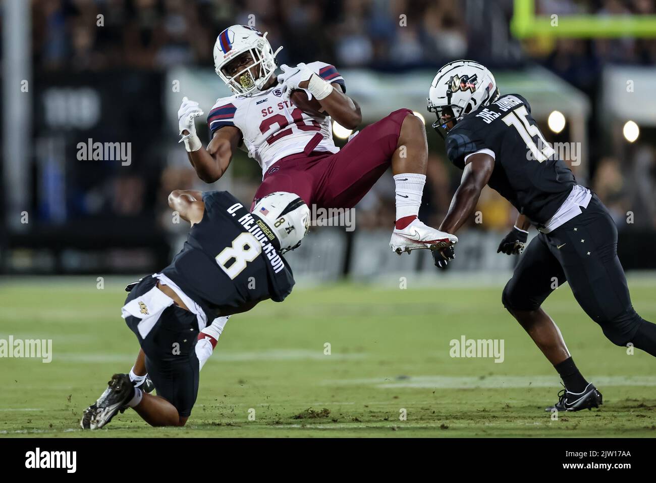 September 1, 2022: South Carolina State Bulldogs defensive back RIDGE FORD (20) gets tackled during the University of Central Florida Knights and the South Carolina State Bulldogs NCAA football game at FBC Mortgage Stadium. (Credit Image: © Cory Knowlton/ZUMA Press Wire) Stock Photo