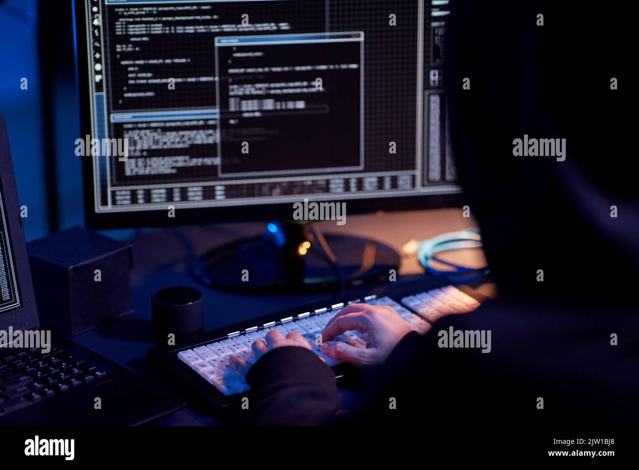 hacker using computer virus for cyber attack Stock Photo