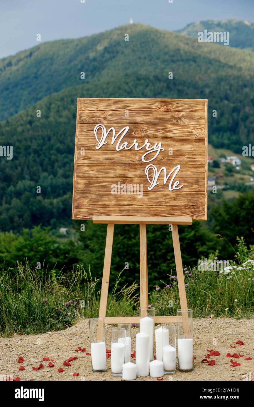 A romantic location in the mountains for a proposal of the hand and the ...