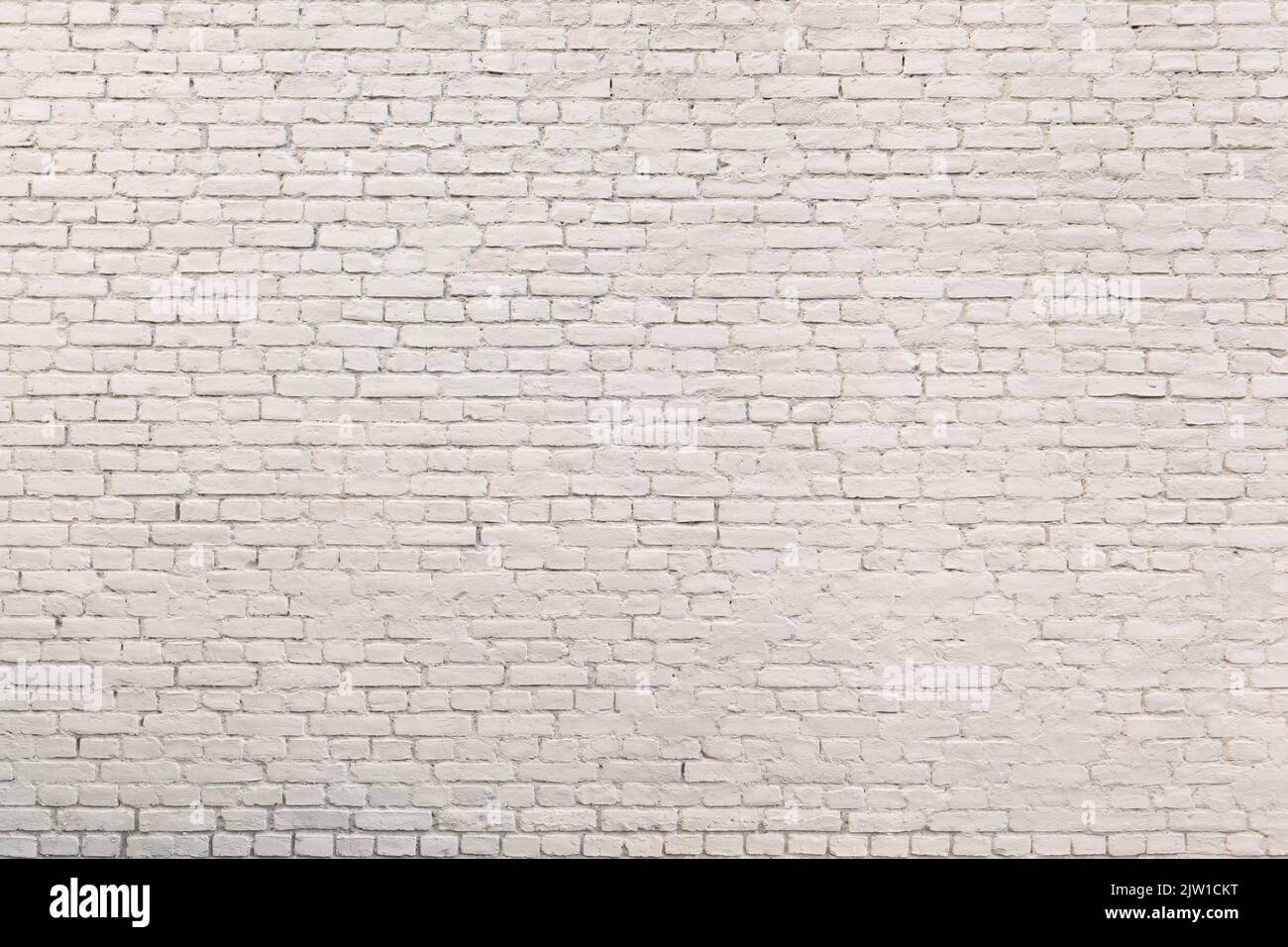 Old large white painted shabby chic brick wall (copy space Stock Photo