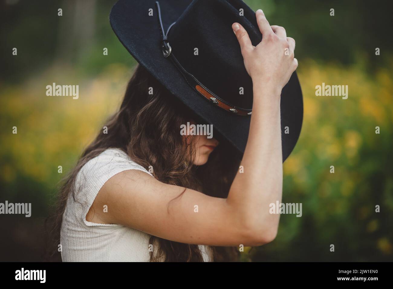 female teen hat cowboy country western dress girl girls gown female teen  hat Stock Photo - Alamy