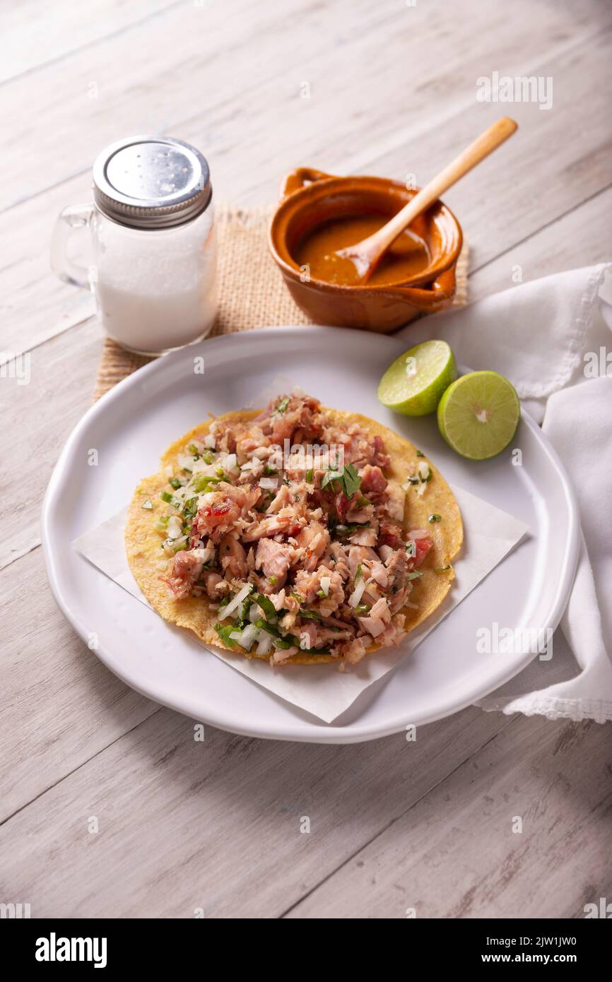 Taco de Carnitas. Cornmeal tortilla with deep fried pork. Traditional