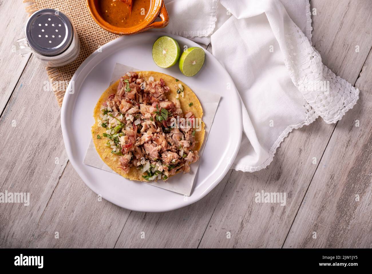 Taco de Carnitas. Cornmeal tortilla with deep fried pork. Traditional