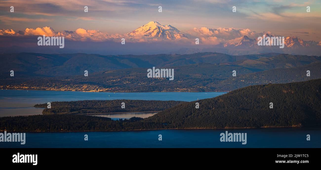 Mount Baker and the Cascade Range from across the Rosario Strait, at Orcas Island's Mount Constitution Stock Photo