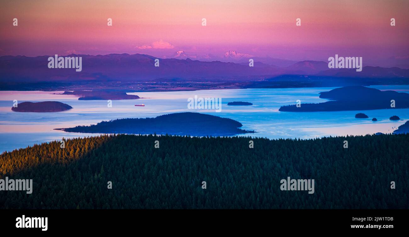 Mount Baker and the Cascade Range from across the Rosario Strait, at Orcas Island's Mount Constitution Stock Photo