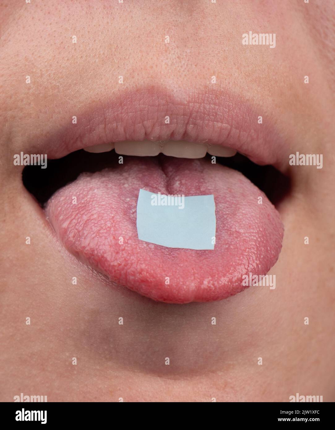lsd mark on tongue closeup, psychedelic drug trip Stock Photo Alamy