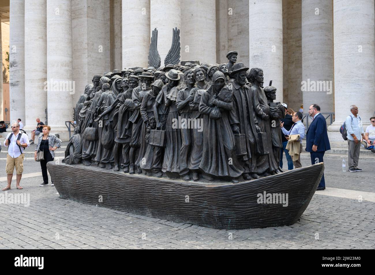The sculpture “Angels Unawares” by Canadian artist Timothy P. Schmalz in St Peter’s Square in the Vatican. Stock Photo