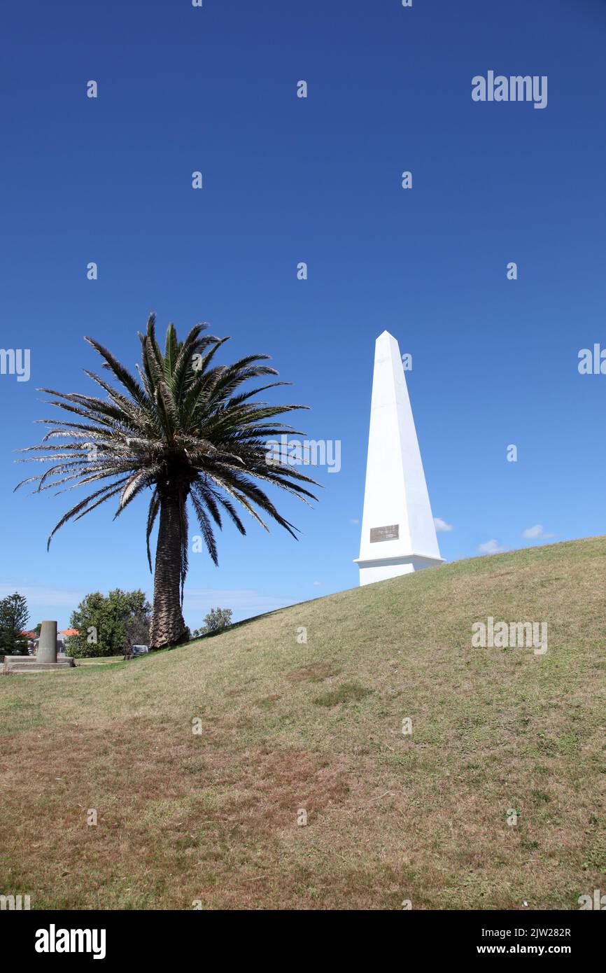 The obelisk is a prominent local landmark in Newcastle Australia. The obelisk was erected in 1850 as a navigation aid for shipping in the nearby Newca Stock Photo