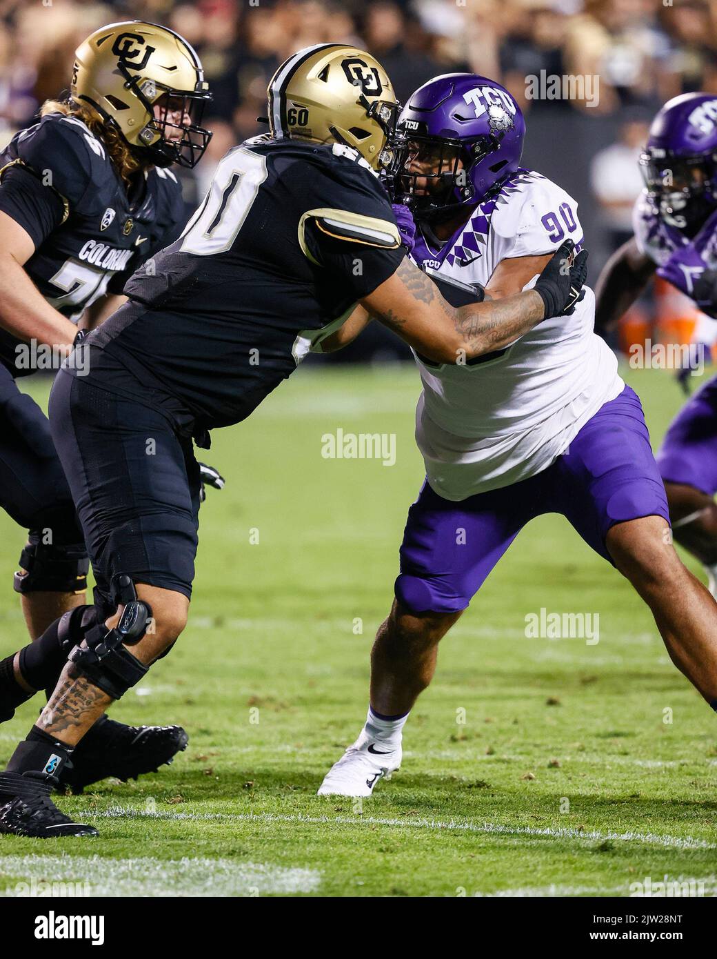 Boulder, CO, USA. 02nd Sep, 2022. Colorado Buffaloes offensive lineman Jake Wiley (60) and TCU Horned Frogs defensive lineman Caleb Fox (90) battle at the line in the first half of the football game between Colorado and TCU at Folsom Field in Boulder, CO. Derek Regensburger/CSM/Alamy Live News Stock Photo