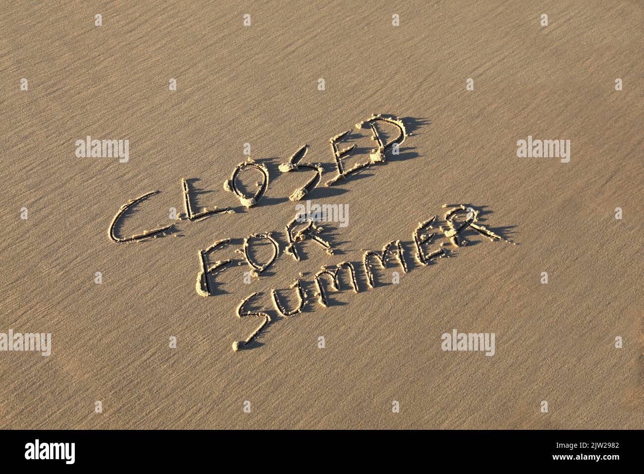 A Summer holiday concept - Closed for Summer. Stock Photo
