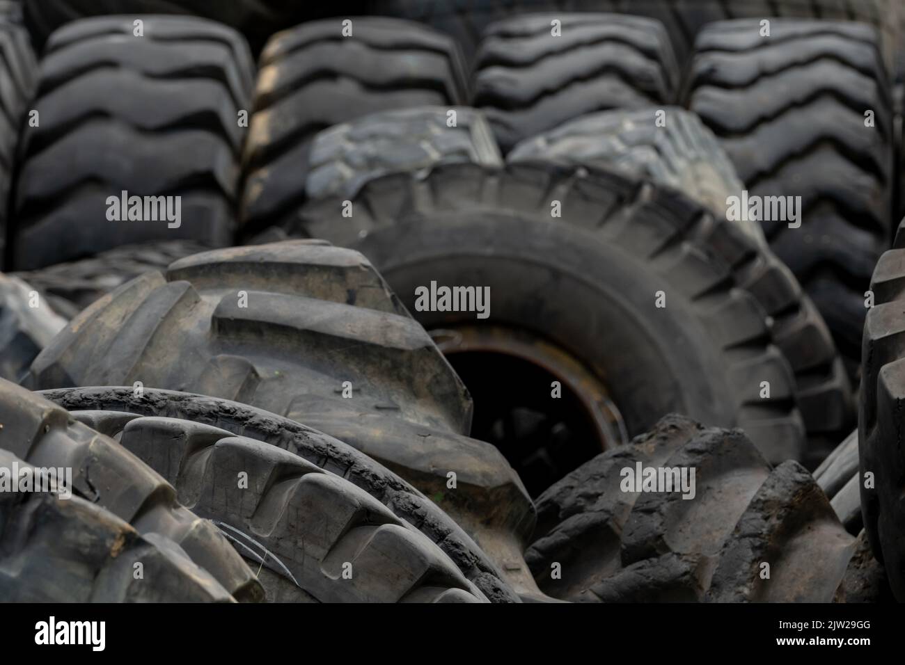 Closeup used truck tires. Old tyres waste for recycle or for landfill